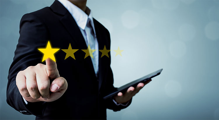 photo of a man pointing at stars