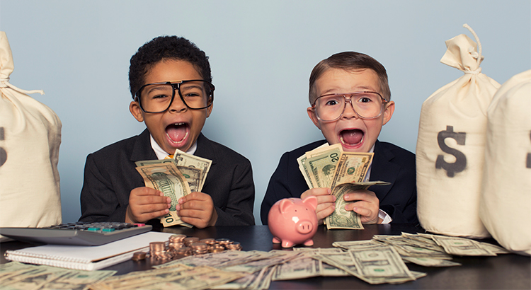 kids playing with dollar bills