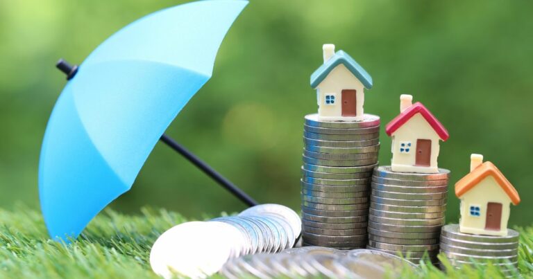 houses sitting on coins