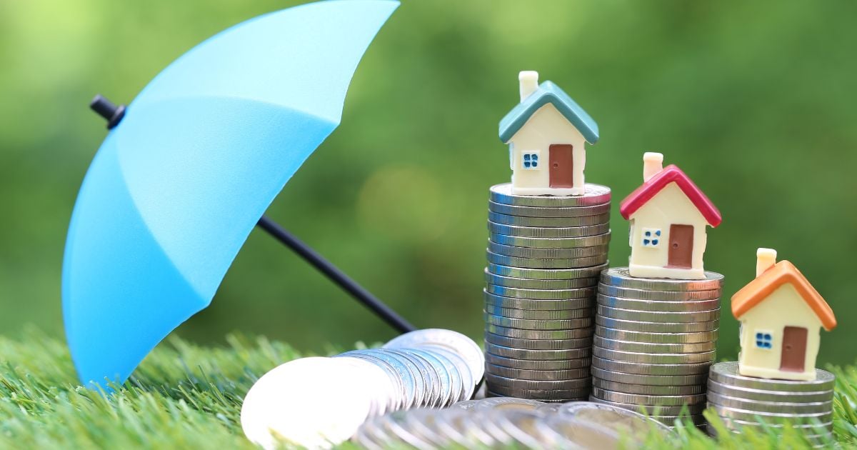 houses sitting on coins